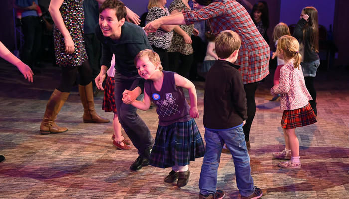 Families dancing at the Celtic Connections Family Ceilidh